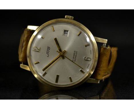 A Vintage Uno 9ct gold cased gentleman's wristwatch. silvered dial, Arabic numerals and baton markers, centre seconds, date a