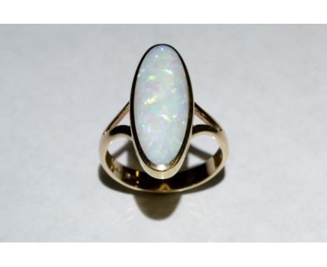 An opal navette shaped ring, 9ct gold shank, finger size N, 4.8g