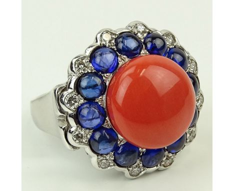 Lady's Fine Gem Quality Sapphire, Coral, Diamond, and 14 Karat White Gold. Coral measures 13mm diameter. Signed 14K 585. Very