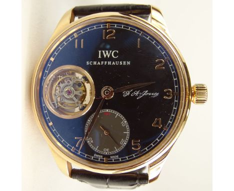 Men's IWC 18 Karat Rose Gold Limited Edition Tourbillon Watch with Black Face. Signed and numbered 44/500. Very good conditio