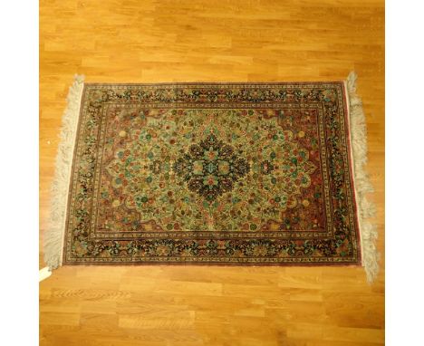 Hand Knotted Chinese Silk Carpet. Unsigned. Fringe Loss or in Good condition. Measures 74" x 50". Shipping $45.00 