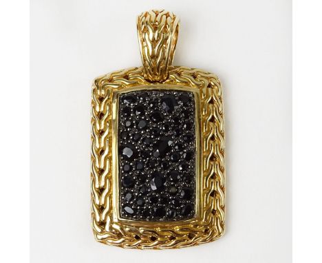 Men's John Hardy 18 Karat Yellow Gold and Black Sapphire Pendant. Signed. Very good condition. Measures 1-3/4 inches long and