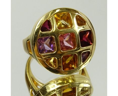 Very Fine Quality Cartier Multi Gemstone and 18 Karat Yellow Gold Ring. Signed Cartier No.64 NM0509 750. Very good condition.