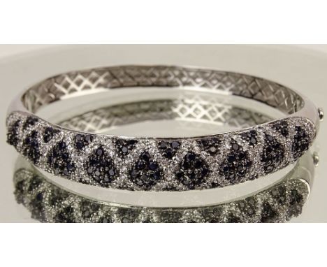 Lady's High Quality Sapphire, Diamond and 14 Karat White Gold Bangle Bracelet. Signed 14K. Very good condition. Measures 1/2 