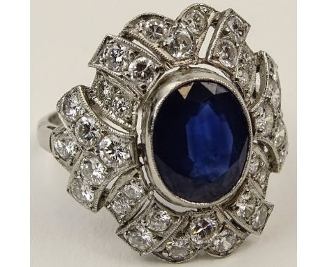 Lady's Estate Approx. 2.78 Carat Oval Cut Sapphire, 1.25 Carat Diamond and Platinum Ring. Sapphire with nice color and clarit