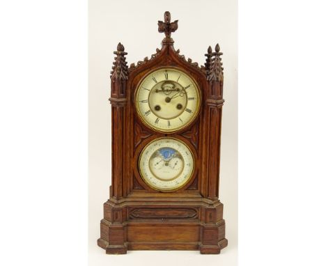 19th Century French Howell & James Moon Phase Mantel Clock with Carved Gothic style Wood Case. Signed. Measures 21 inches tal