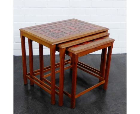 Nest of three teak tile top tables, 47 x 60cm (3)