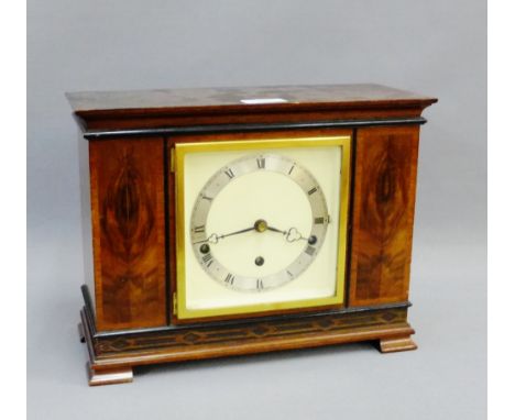 Mahogany cased mantle clock, the silvered chapter ring with Roman numerals on bracket feet, 33 x 25cm 