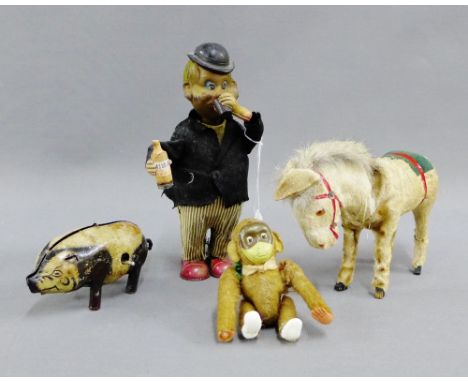 Vintage clockwork Drinking Man automaton, 19cm high, together with a Donkey, a Monkey and a tin plate Pig (a/f), (4) 