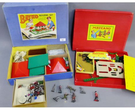 Vintage Bayko building set and Meccano, together with a small carton containing play worn die cast figures etc., (a lot) 