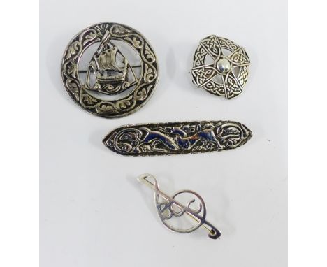 Celtic Art Industries silver brooch, Iona silver brooch, and two other silver brooches (4) 