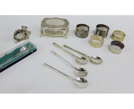 Mixed lot to include three silver napkin rings, Epns wares comprising trinket box, coffee spoons, napkin rings and cat clock,