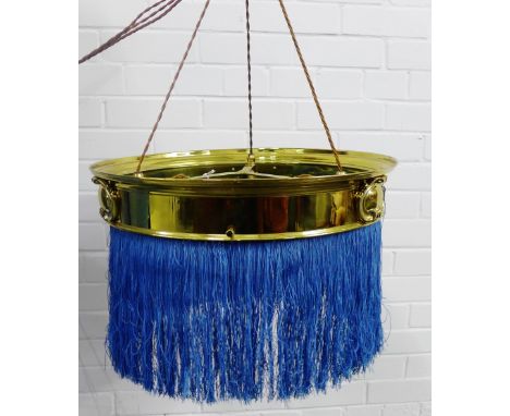 Early 20th century brass rise and fall light with blue fringes, the brass stamped B &amp; L, complete with pulley and weight