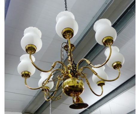 Brass eight-branch ceiling light with opaque glass shade, 80cm wide