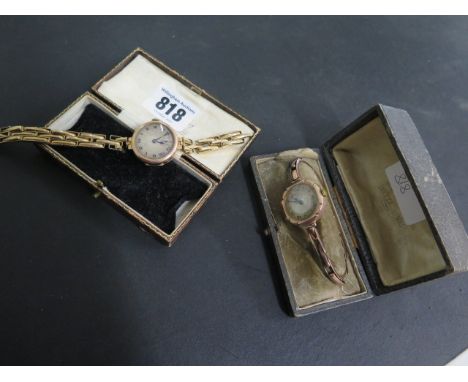 Two 9ct yellow gold manual wind wristwatches with sprung straps, one has a broken strap- not running, other running, hands ad