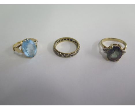 An 18ct ring, size K, approx 3.2 grams, a 9ct ring, size O approx 4 grams, and a silver and gilt ring (missing two stones) 