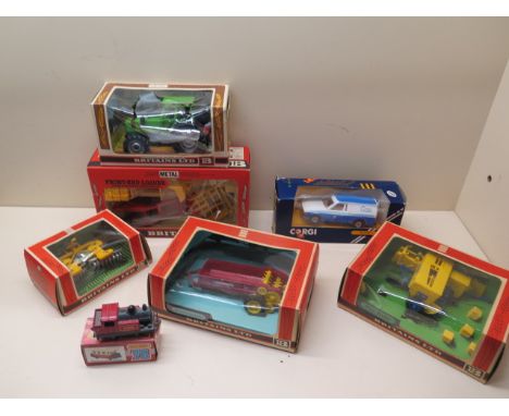 Five boxed Britains Ltd farm implements and tractor, a boxed Corgi Gas Escort van and a Matchbox 75 loco, boxes and plastic h