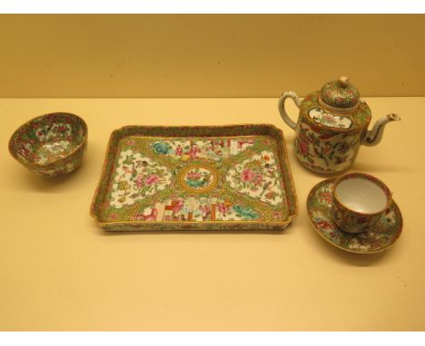 A matched famille rose Canton bachelors part tea set on tray, teapot with associated top otherwise reasonably good, tray size