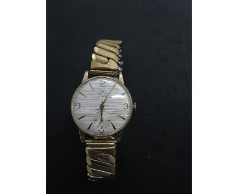 A Smiths 9ct yellow gold Railway presentation manual wind wristwatch with a 30mm case on a sprung plated strap, dial good, ru