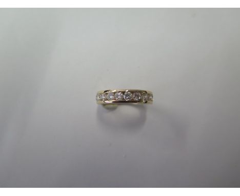 A yellow gold eleven stone diamond ring, size K, approx 3.6 grams, diamonds bright and well matched in good condition, not ha