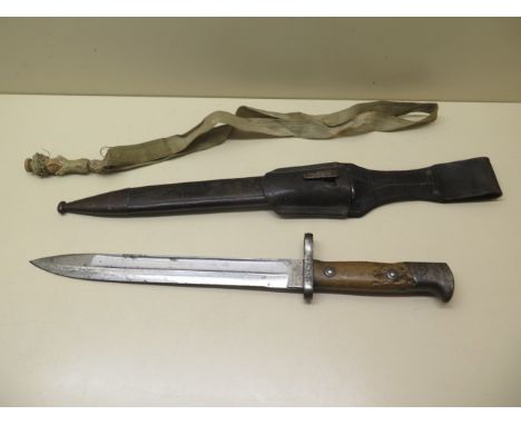 A German knife bayonet with scabbard and Troddel, the blade marked Weyersberg Kirschbaum &amp; Co Soligen, stamped 74.R.13.23