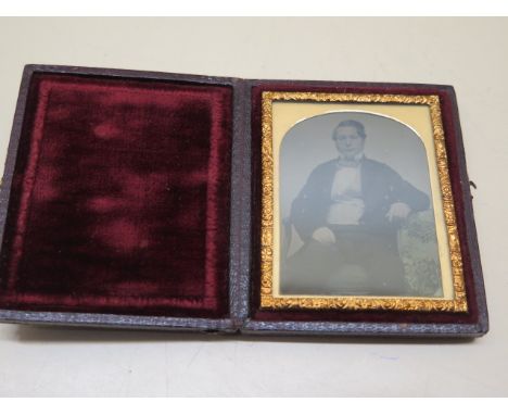 An Ambrotype photograph of a gentleman by Edwin Sutton, 6cm x 7cm 