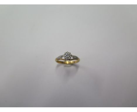 A hallmarked 18 ct yellow gold diamond solitaire ring, size I, approx 2.3 grams, in good condition 