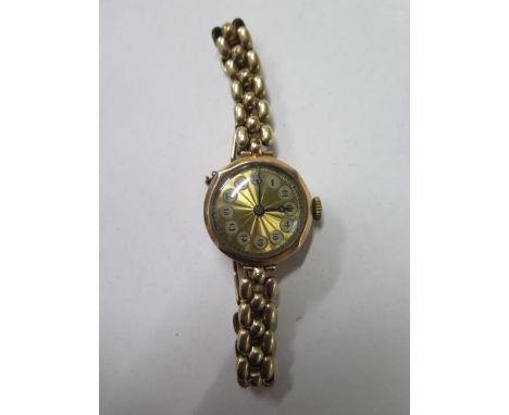 A 9ct yellow gold manual wind ladies wristwatch on a plated strap, not working, approx total weight 22.5 grams 