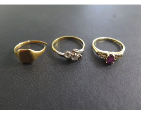 Two 18ct yellow gold rings, one missing a stone and a cut gold ring, tests to approx 18ct, total weight approx 7.3 grams 