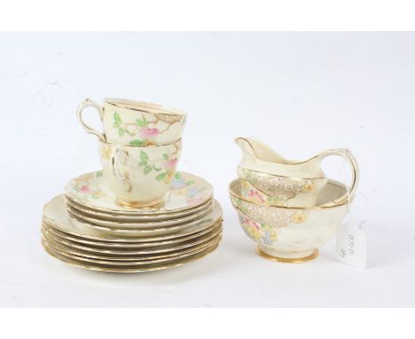 Quantity of Grosvenor china tea ware, decorated with colourful flowers, comprising two cups, four saucers, six tea plates, su