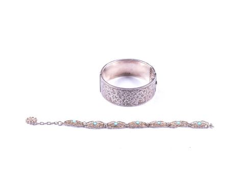 A silver half hinged bangle and a filigree bracelet, a silver half hinged bangle, 25mm wide hollow bangle, engraved foliate d