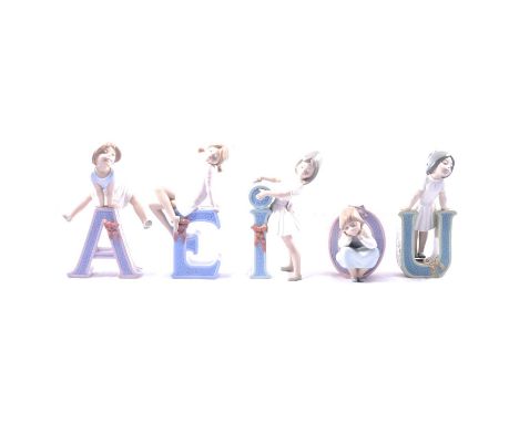 Set of five Lladro Alphabet figurines - the Vowels 'A', 'E', 'I', 'O', 'U', each modelled with a Schoolgirl interacting with 