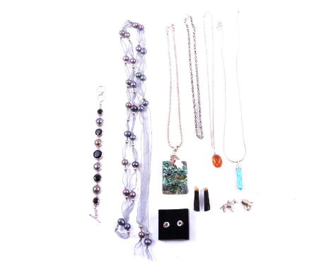 CATALOGUE AMENDMENT - A collection of modern silver and white metal jewellery, some gemset, an amber and white metal spider b