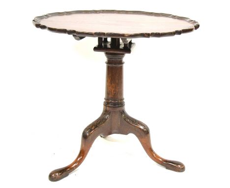 Georgian style mahogany tripod table, circular tilt top with pie crust edge, birdcage action, turned column on three splayed 