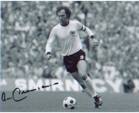 Franz Beckenbauer signed 10x8 picture playing for West Germany. Good condition. All signed items come with our certificate of