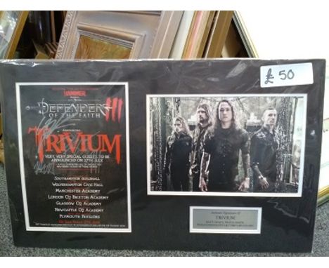 Trivium signed tour flyer. Autographed by Brent Young, Travis Smith, Matt Heafy, Corey Beaulieu, Paolo Gregoletto. Nicely mou