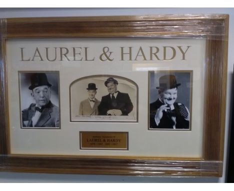 Laurel and Hardy signed autograph display. Sepia 6 x 4 photo signed by both framed and mounted to high standard with individu