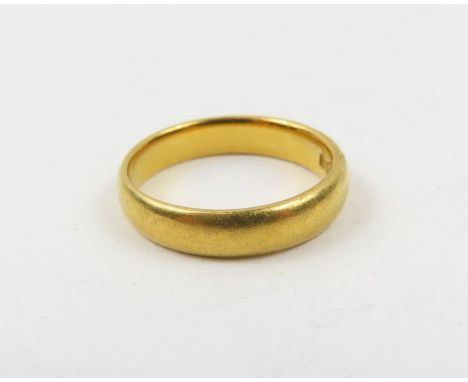 A 22ct gold wedding band, 4mm wide, finger size K 1/2, 4.62g gross