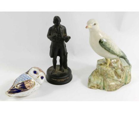 A Royal Crown Derby owl paperweight, along with a Josiah Wedgwood figure and Radford model of a seagull 