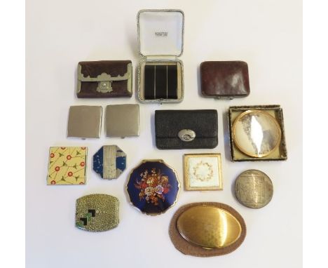 A collection of vintage compacts and purses