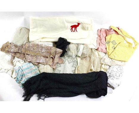 A collection of vintage linens, clothing and textiles to include parachute silk, christening gowns and lace