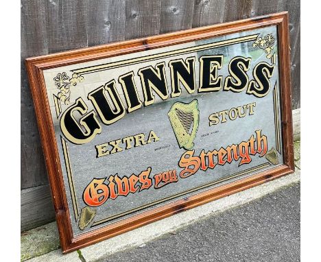 A vintage Guinness advertising mirror, 63cm x 94cm 