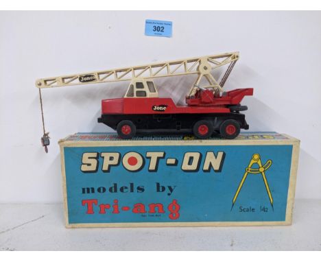 A boxed Spot-On Triang model of a 117 Jones crane with a red body with white crane arm in original box Location:If there is n