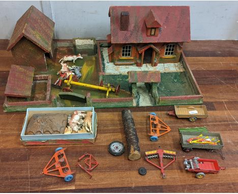 A home built model farm yard with model farm machinery and animalsLocationIf there is no condition report shown, please reque