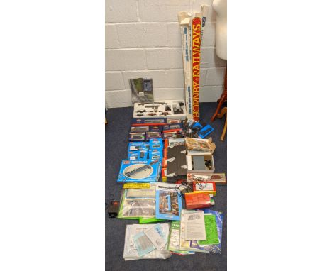 A substantial collection of model railway equipment and accessories including track, locomotives, tenders, stations and lands
