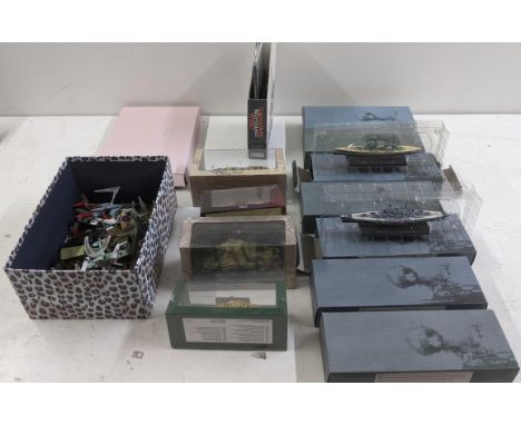 A collection of military Diecast model military vehicles to include various boxed Atlas editions model battleships, an Atlas 