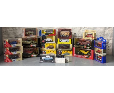A collection of boxed diecast model vehicles to include a Burago 1/24 scale 1936 Bugatti Atlantic, a Corgi Vanguards 1/43 sca