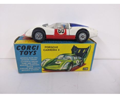 Corgi Toys 330 - Porsche Carrera 6 with an opening rear, a detailed engine, racing hubs and tyres, moulded headlight shield, 