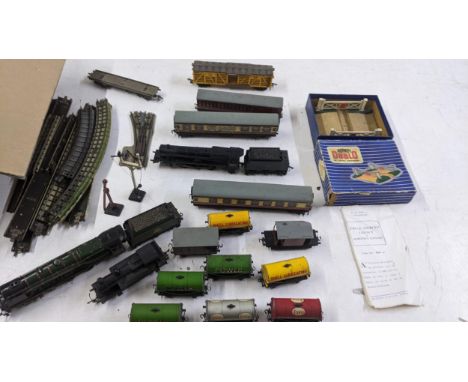 A collection of Hornby Dublo model railway equipment to include a boxed D1 level crossing, a Duchess of Montrose locomotive, 