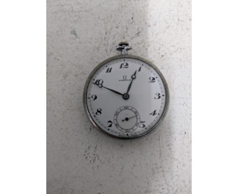 An Omega pocket watch, plated case engraved depiction of a steam engine to the back, Arabic numerals, serial number 8070673, 